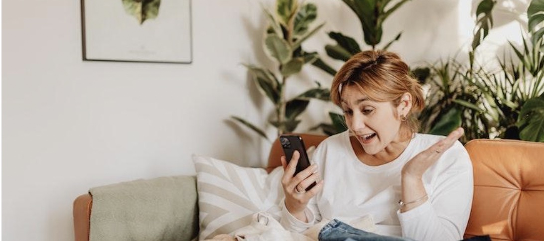 a woman Facetiming her friend and couples experience